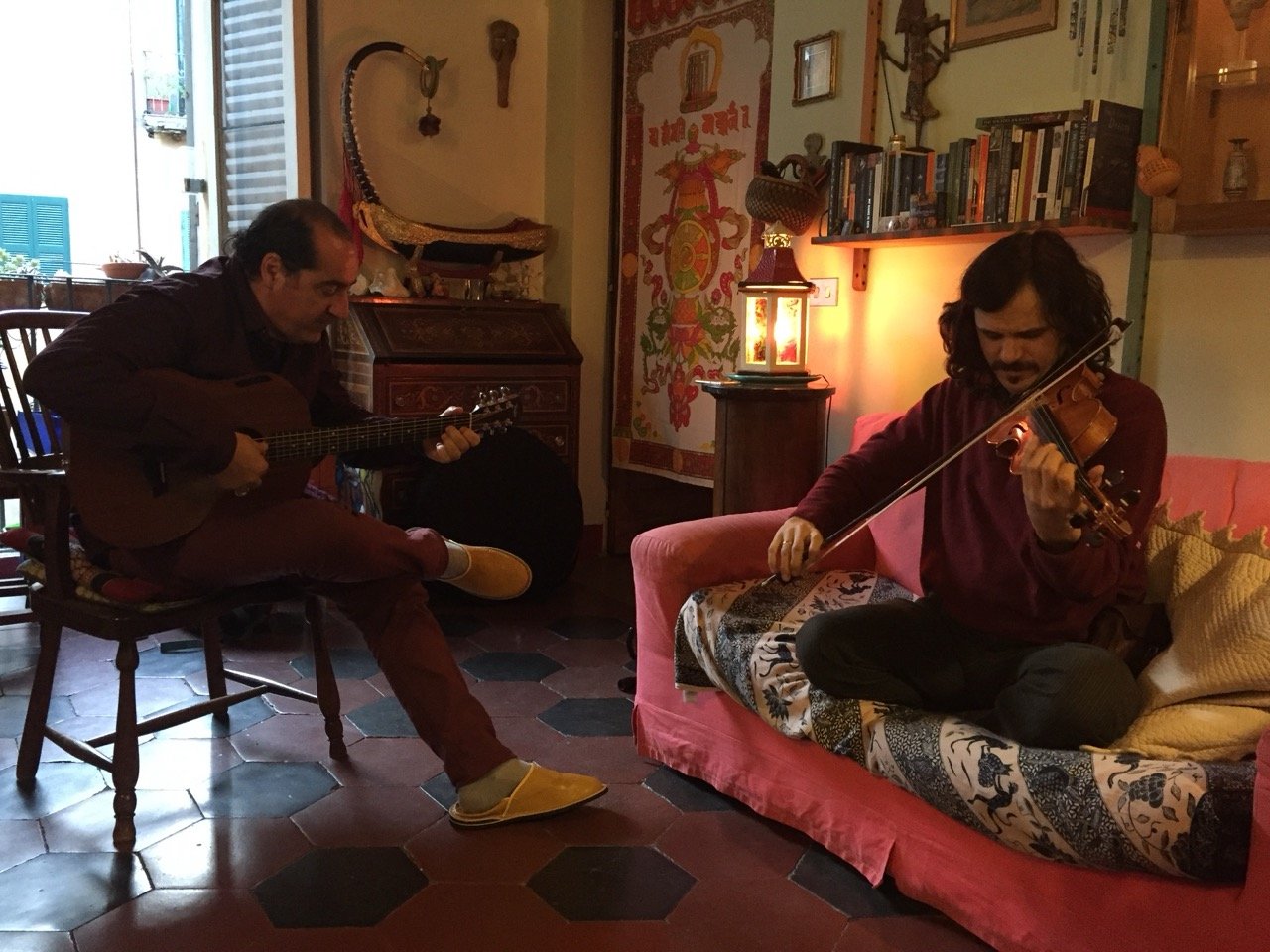 Nando Citarella and Tcha Limberger during rehearsal — Nando on guitar, Tcha on violin, afternoon light