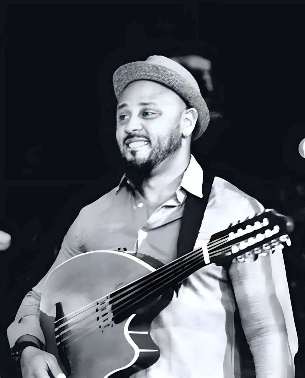 Portrait of Marwan Samer with his oud